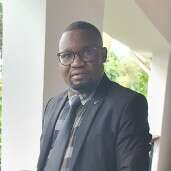 GODFREY AUGUSTINO KOLOWOGA